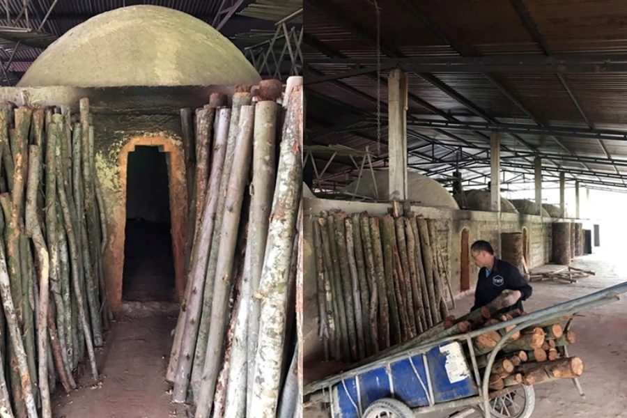 Loading wood through the traditional kiln entrance