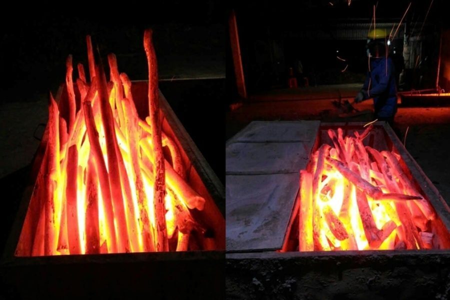 Wood burning inside the kiln during carbonization